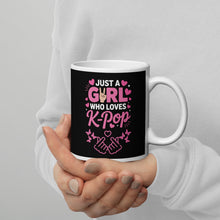 Load image into Gallery viewer, Mug with &#39;Just a Girl Who Loves K-Pop&#39; text held by a person against a gray background
